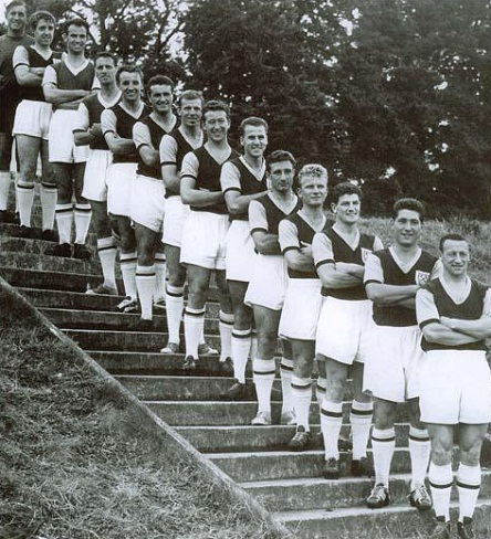 The title-winners line up for a photocall