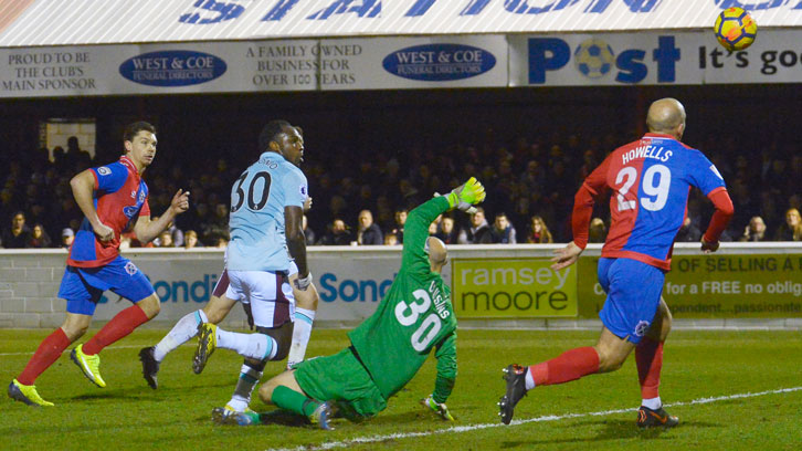 Michail Antonio scores the first of his two goals at Dagenham & Redbridge