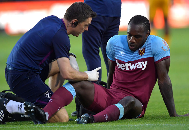 Richard Collinge tends to Michail Antonio