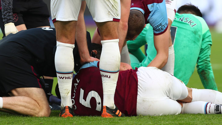 Vladimir Coufal lies injured