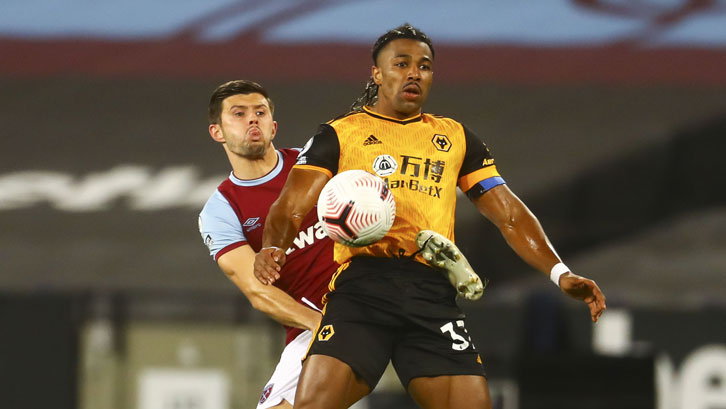 Aaron Cresswell marks Adama Traore