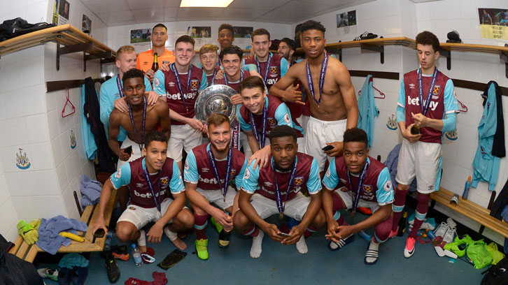 Grady Diangana (front row, far right) and his U23 teammates celebrate winning promotion