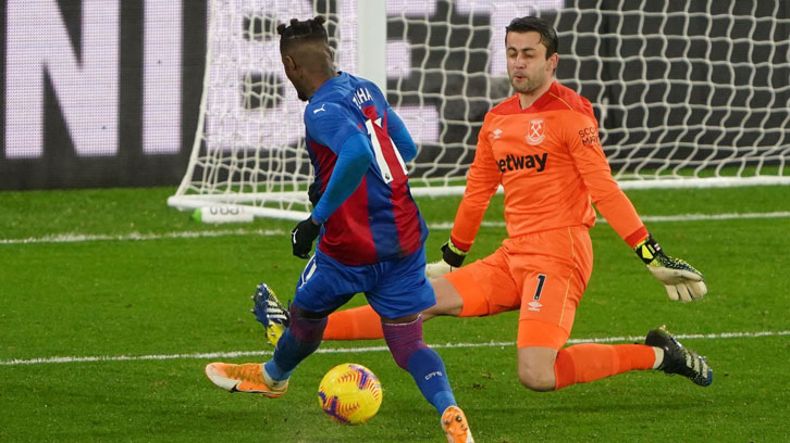 Łukasz Fabiański made a vital save from Wilfried Zaha just after half-time