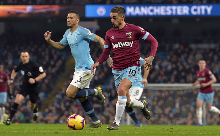 Manuel Lanzini takes on the Manchester City defence on Wednesday night