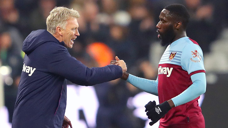 Arthur Masuaku shakes hands with manager David Moyes