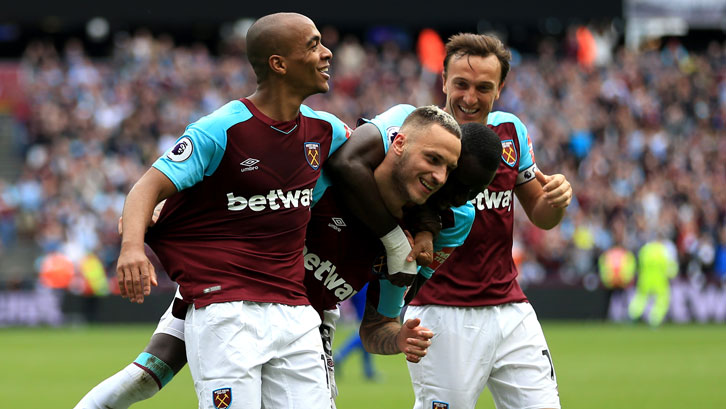 Mark Noble celebrates one of Manuel Lanzini's two goals against Everton