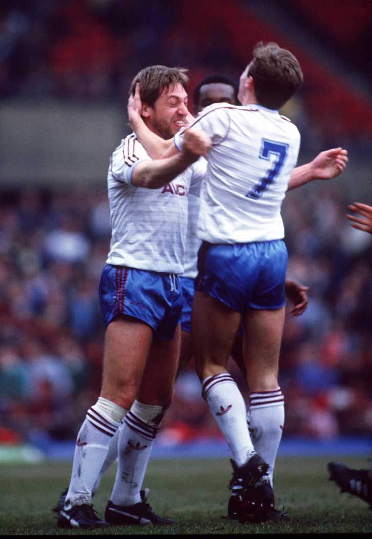 Mark Ward celebrates with Geoff Pike at Old Trafford