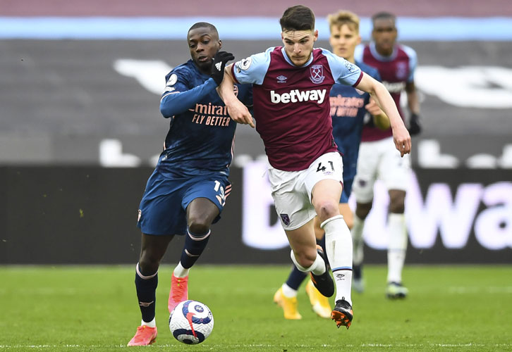 Declan Rice drives forward against Arsenal