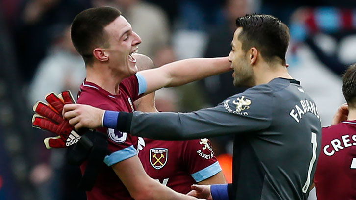 Declan Rice and Lukasz Fabianski celebrate