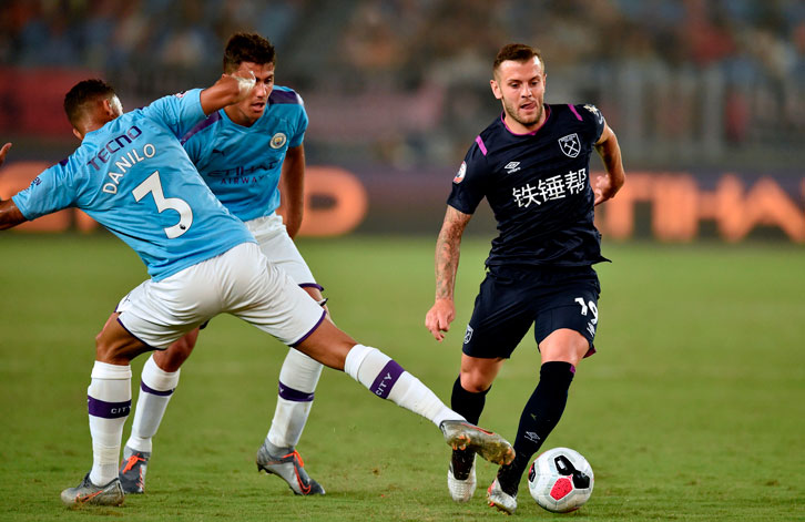Jack Wilshere takes on Danilo