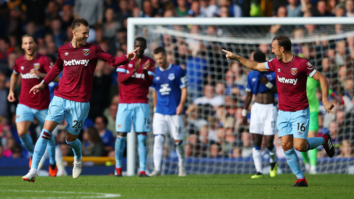 Andriy Yarmolenko celebrates his second goal with Mark Noble